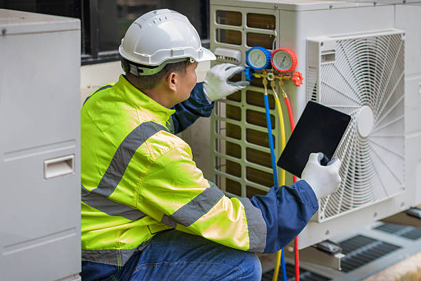 Professional Heat Pump Repair technician working in Lee Center, NY